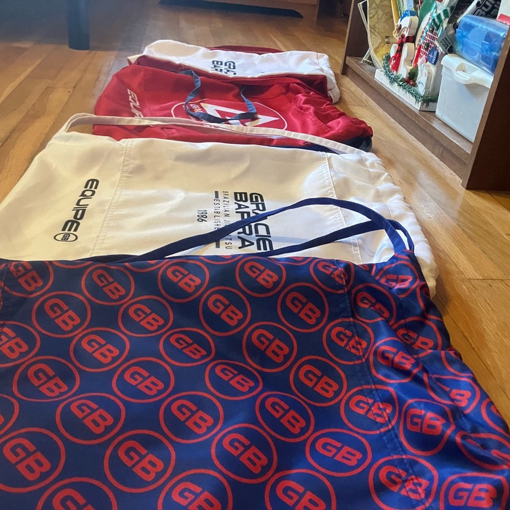 Gracie barra drawstring bags. Two white two blue.